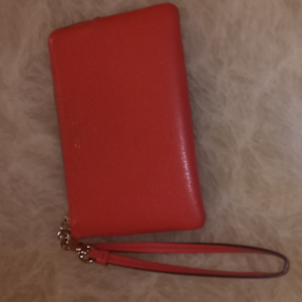 Coach coral wristlet